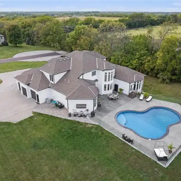 LUXURY ESTATE ON FOUR ACRES IN THE WILDFLOWER SUBDIVISION