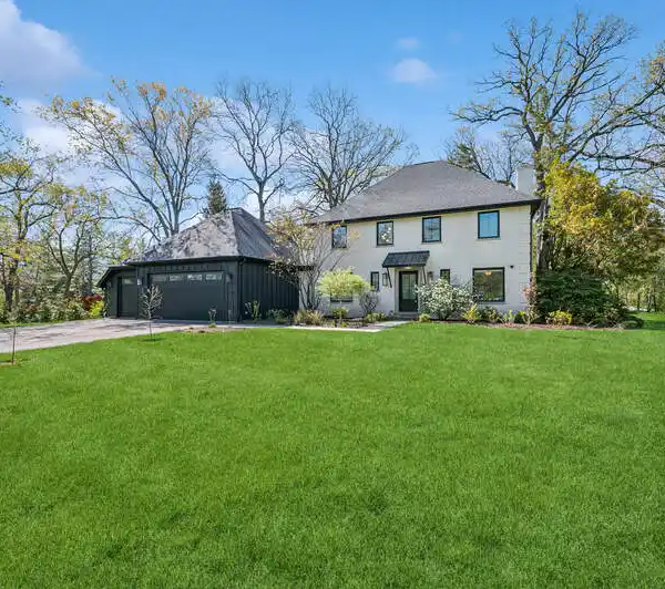 EXPANDED AND RENOVATED HOME IN GLEN OAK ACRES
