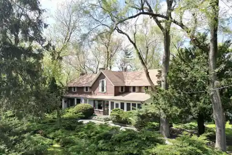 Spacious Home on 110 Acres with Barn and Pond