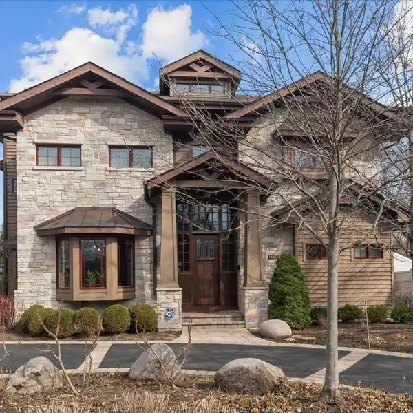 CUSTOM HOME BACKING TO WOODLAND PARK