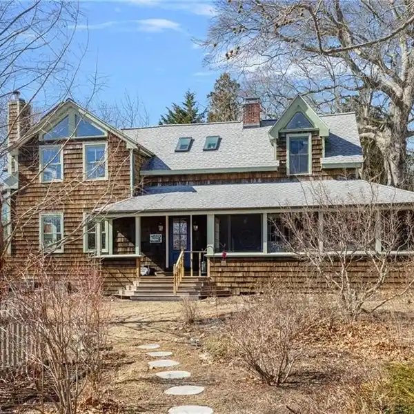 SHINGLED COTTAGE ON A CORNER LOT IN THE HEART OF WEST FERRY