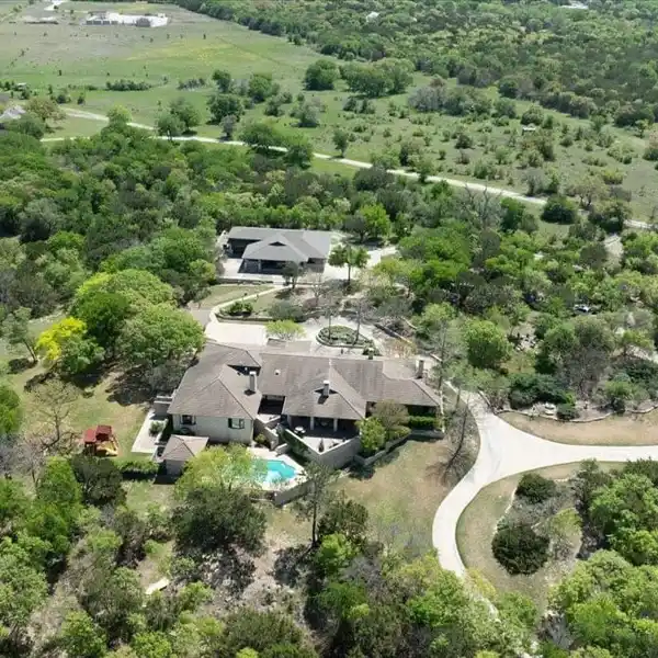RARE ARCHITECT-DESIGNED SINGLE-LEVEL ESTATE ON 8.77 ACRES