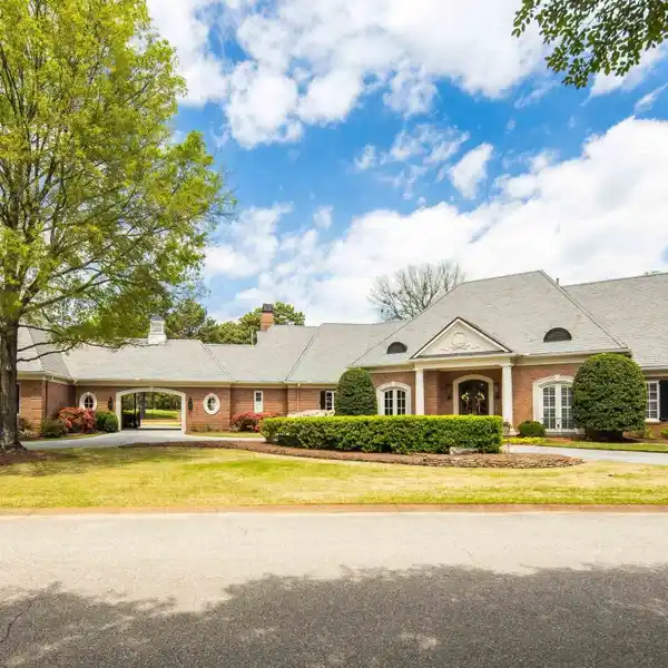 BEAUTIFUL AND EXPANSIVE BRICK HOME WITH POOL