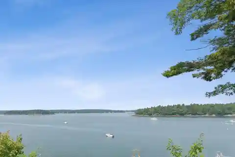 Rare Waterfront Acreage with Classic Coastal Cottage