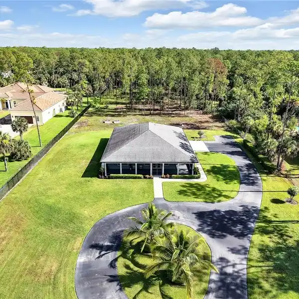 EXPANSIVE NAPLES ACREAGE WITH ENDLESS POSSIBILITIES