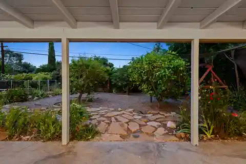 Mid-century Oasis with Exceptional Flow in a Delightful Neighborhood