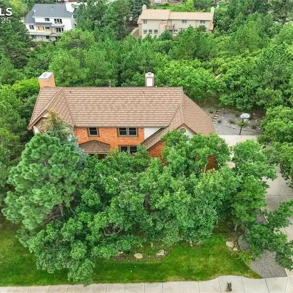 BROADMOOR BLUFFS HOME WITH MOUNTAIN AND CITY VIEWS