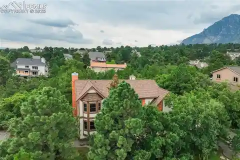 Broadmoor Bluffs Home with Mountain and City Views