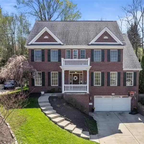 RED BRICK COLONIAL ON A QUIET CUL-DE-SAC