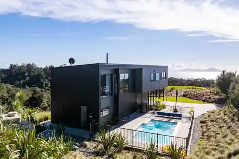 Modern Coastal Retreat Amid Native Bush