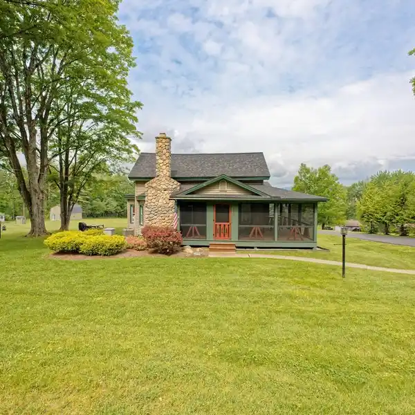 BEAUTIFULLY RENOVATED LAKE HOUSE ON FOUR ACRES