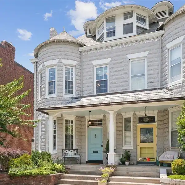 BRIGHT, UPDATED ROWHOUSE WITH FLEXIBLE LIVING SPACES