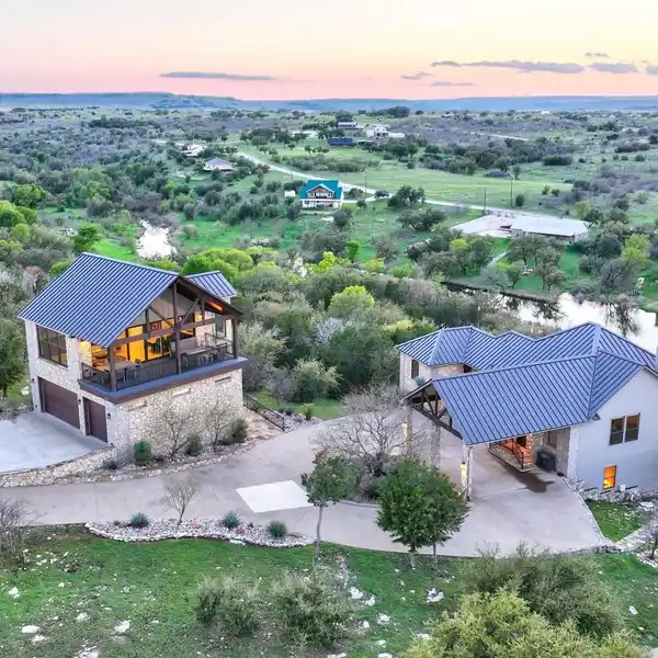 CUSTOM WATERFRONT HOME IN PRESTIGIOUS SPORTSMANS WORLD AT POSSUM KINGDOM LAKE