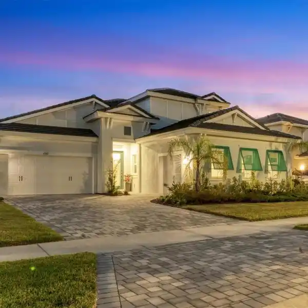 REFINED COASTAL LIVING IN GATED ELEGANCE