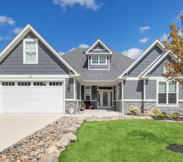 BEACH TOWN CHARM STEPS AWAY FROM LAKE MICHIGAN