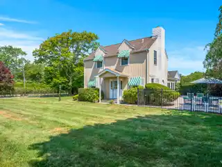 Serene Quogue Estate with Gated Entrance and Pool
