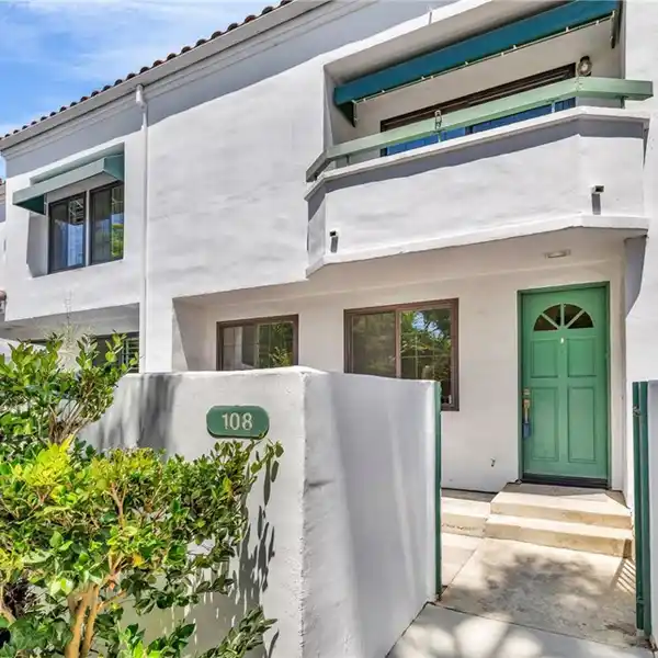 EXPANSIVE TOWNHOUSE IN GUARD GATED PACIFIC RANCH