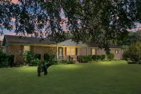 Expansive One-Story Estate with Creek, Pond, and Workshop