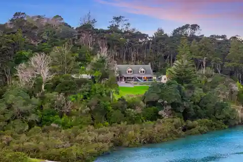 Secluded Weiti River Retreat with Private Jetty