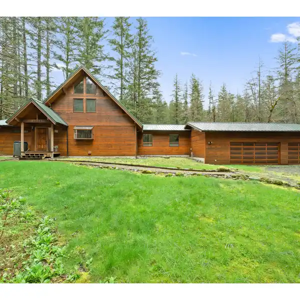 SCENIC CEDAR HOME WITH RIVER ACCESS AND GENEROUS ACREAGE