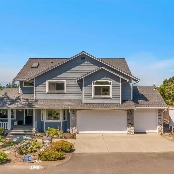 REMODELED RETREAT WITH MOUNTAIN AND SOUND VIEWS