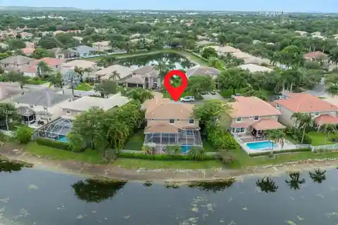 Beautifully Maintained Two-Story Lakefront Pool Home