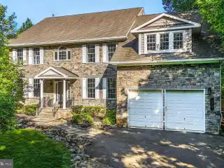 Luxurious Stone-Front Home with Outdoor Oasis
