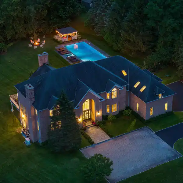 STATELY BRICK COLONIAL ON NEARLY THREE PRIVATE ACRES