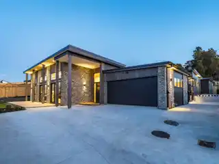 Grand Dual-Residence Estate in Prestigious Swanson Enclave