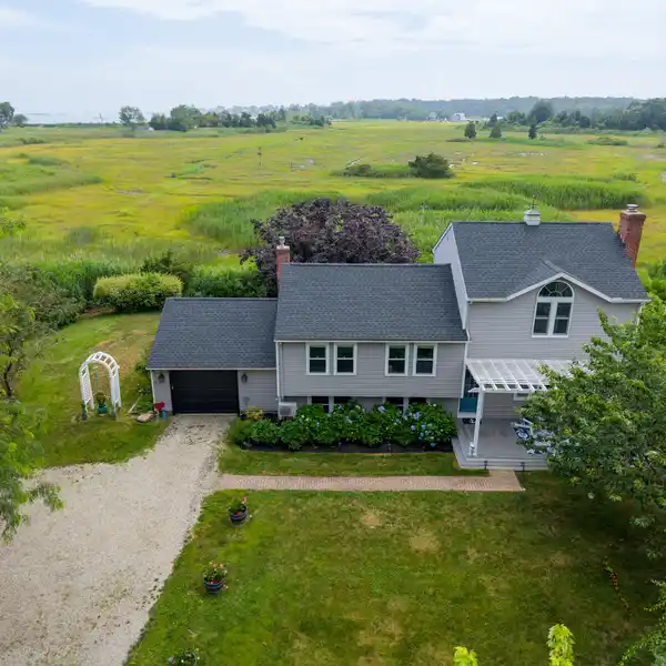 EXCEPTIONAL TURNKEY PROPERTY ON A PEACEFUL ACRE