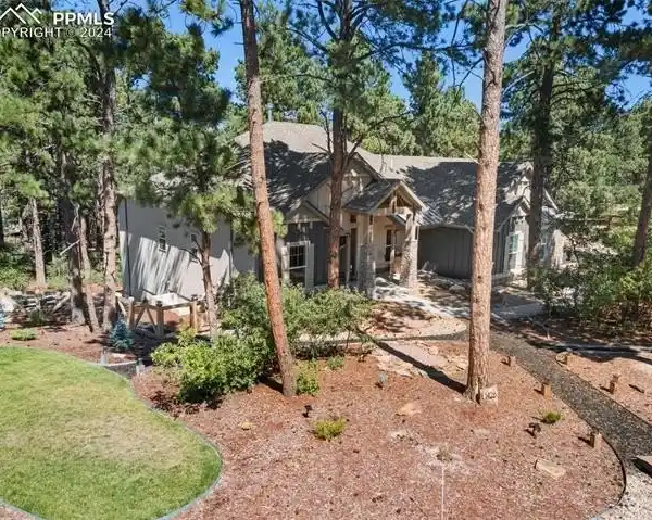 CUSTOM HOME ON A CORNER LOT IN COVETED CHISHOLM