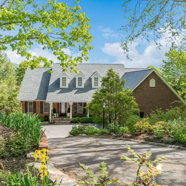 ELEGANT BRICK HOME IN THE REEMS CREEK GOLF COMMUNITY