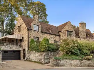 Exquisite Stone Estate on a Coveted Cul-de-sac