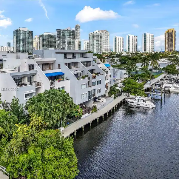 UNIQUE CORNER WATERFRONT TOWNHOME WITH ROOM TO EXPAND