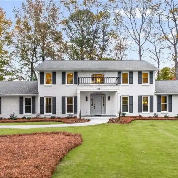 STATELY BRICK RESIDENCE WITH IMPECCABLE DESIGNER UPDATES