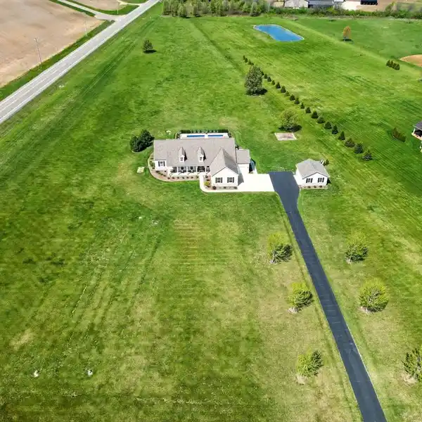 BREATHTAKING CUSTOM HOME ON FIVE ACRES
