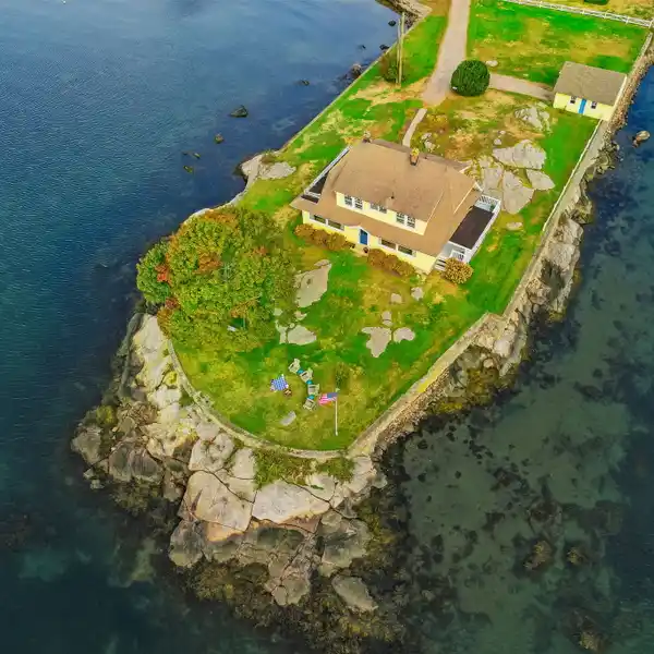 INCREDIBLE DUTCH COLONIAL REVIVAL ESTATE ON ITS OWN PENINSULA