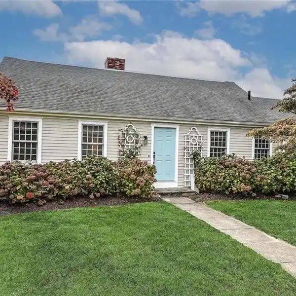 WATERFRONT HOME FEATURING DEEDED SHORELINE & MOORING RIGHTS