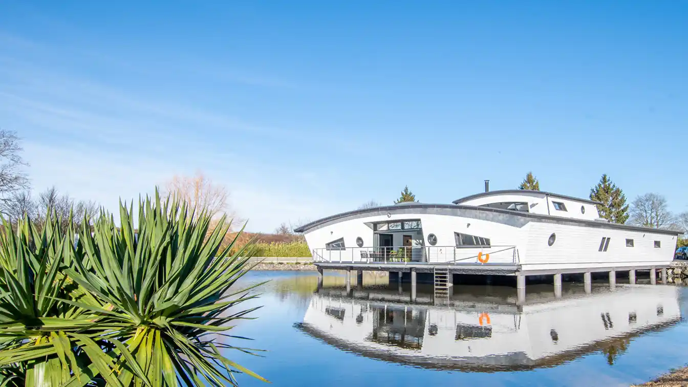 Striking Home Floating Above the Water