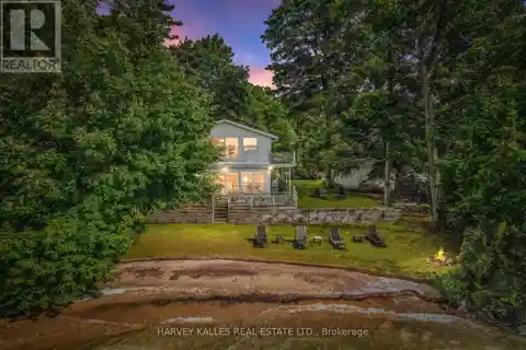 Rare Waterfront Home with Private Beach