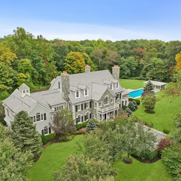 EXQUISITE STONE CUSTOM-BUILT RESIDENCE
