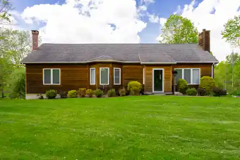 Cedar-Sided Traditional Home on 23 Acres