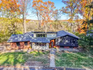 Modern Riverfront Elegance Surrounded by Natural Serenity