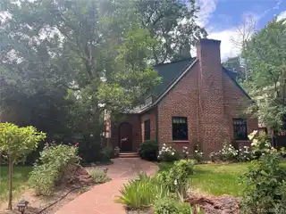 Charming Tudor Home Situated on a Picturesque Hilltop Street