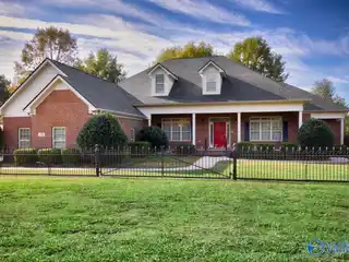 Elegant Brick Estate with Serene Acreage and Luxury Touches