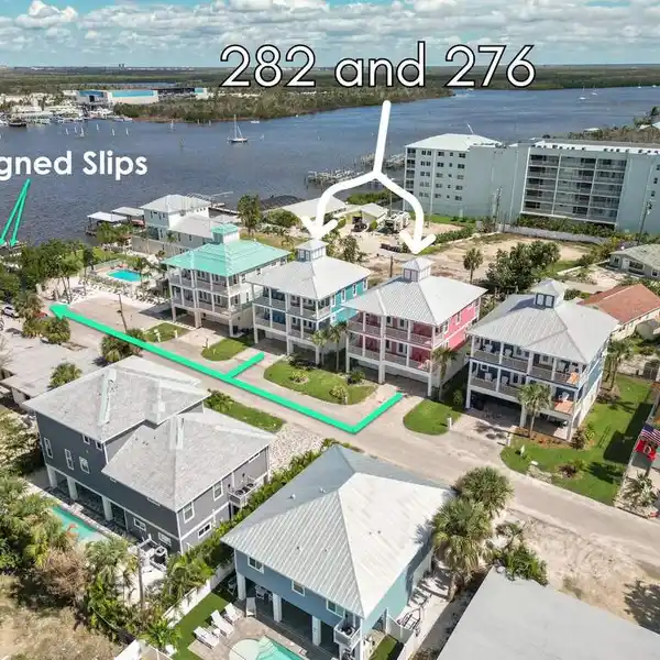 DUAL COASTAL RESIDENCES WITH GULF ACCESS