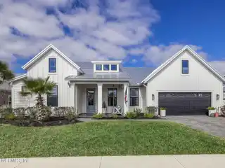 Elevated Coastal Living with Unmatched Amenities