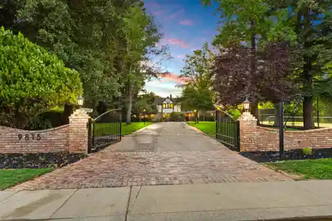 Luxurious Tudor-Style Estate on Manicured Grounds