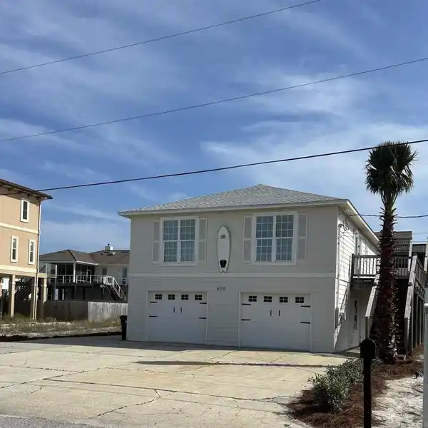 UNIQUE THREE BEDROOM HOME STEPS TO THE BEACH