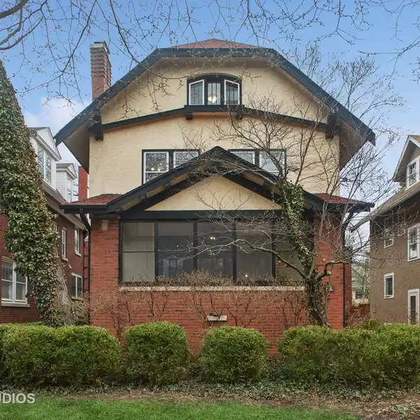 EXCEPTIONAL THREE-STORY CRAFTSMAN STYLE